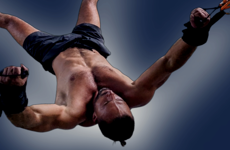 Pravilo session showing a man suspended with arms open and head back, surrendering to a deep gravitational stretch.